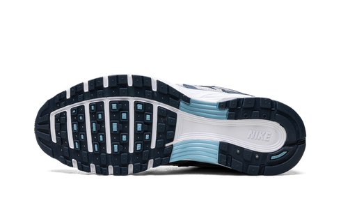 Nike P-6000 Armory Navy and Flat Silver sneaker with mesh and leather layers, available at ASEY SHOP Morocco.