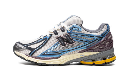Close-up of New Balance 1906R sneaker details in Blue