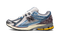 Close-up of New Balance 1906R sneaker details in Blue