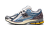 Close-up of New Balance 1906R sneaker details in Blue
