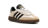 Adidas Handball Spezial WMNS in Wonder White Black, classic white and black sneaker, available at ASEY SHOP Morocco.